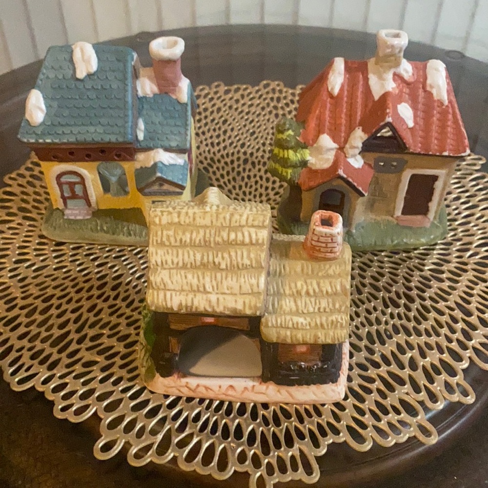 Three ceramic small villages homes.